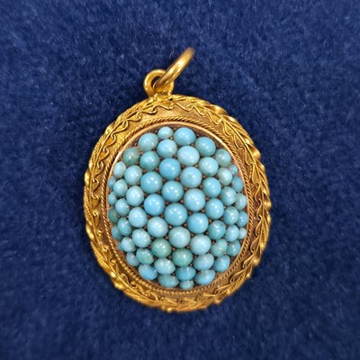 Lot 95 - A 19th Century turquoise, gold locket