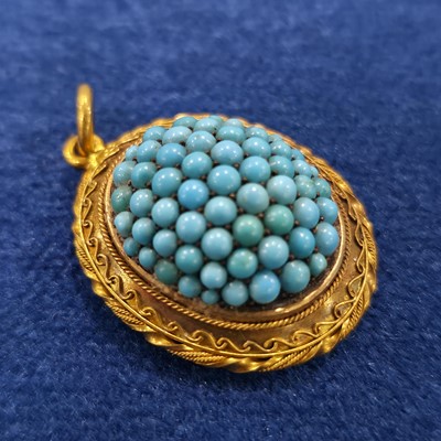 Lot 95 - A 19th Century turquoise, gold locket
