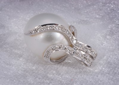 Lot 113 - An 18ct white gold diamond set Southsea cultured pearl pendant