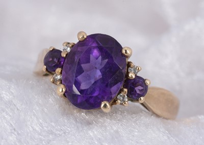 Lot 128 - A 9ct gold amethyst dress ring