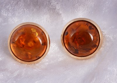 Lot 147 - A pair of 9ct gold amber stud earrings
