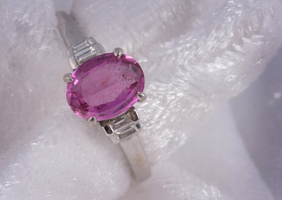 Lot 153 - A 750 marked  white metal pink sapphire and diamond Art Deco style dress ring, sapphire 1.06cts, ring size M1/2 2.4g