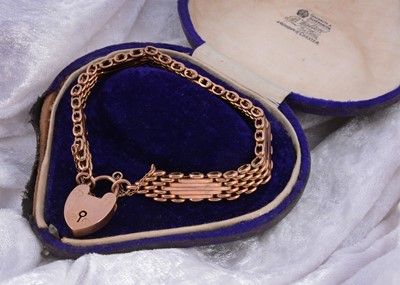 Lot 158 - A 9ct rose gold padlock gate linked bracelet