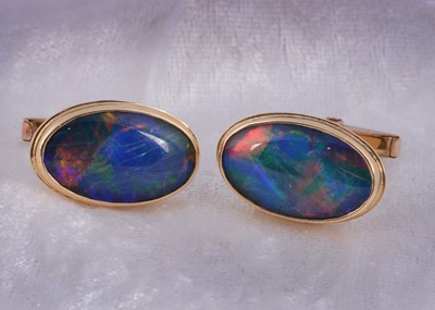 Lot 171 - A pair of Australian 9ct marked black opal cufflinks