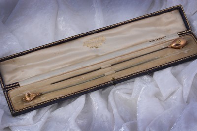 Lot 208 - Two Edwardian 9ct and seed pearl hat pins