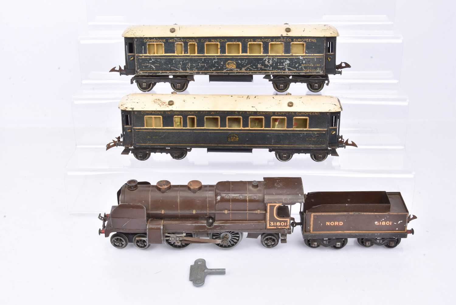 Lot 178 - Hornby 0 Gauge clockwork Blue Train comprising Nord brown 31801 4-4-2 Locomotive and Tender and two Coaches