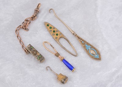 Lot 219 - A continental silver champleve enamel button hook
