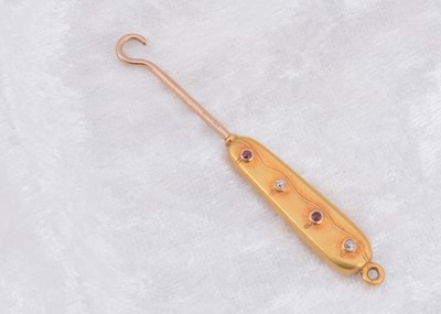 Lot 226 - An art deco Tiffany & Co ruby and diamond button hook