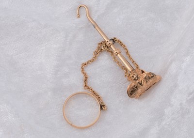 Lot 235 - A 19th Century patent applied button hook ring and handkerchief clasp