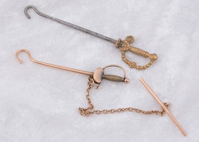 Lot 239 - Two sword handled button hooks