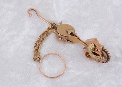 Lot 242 - A Victorian button hook and handkerchief clasp