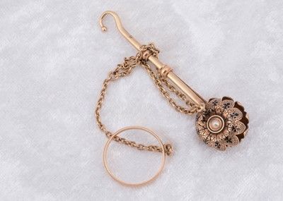 Lot 243 - A Victorian yellow metal enamel and seed pearl button hook and handkerchief clasp
