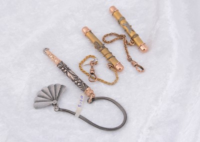 Lot 269 - Three fob lapel button hooks