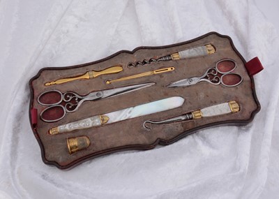Lot 275 - A mother of pearl and gilt metal continental dressing table set