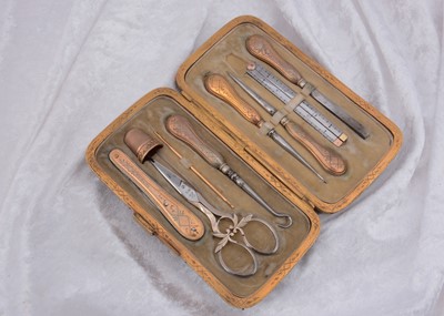 Lot 276 - A continental gilt metal and steel travelling set