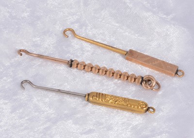 Lot 282 - Three Edwardian button hooks