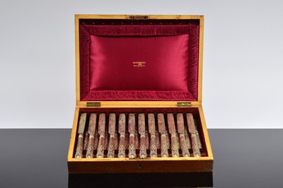 Lot 313 - A cased Edwardian silver knife and fork dessert set for twelve from Walker & Hall