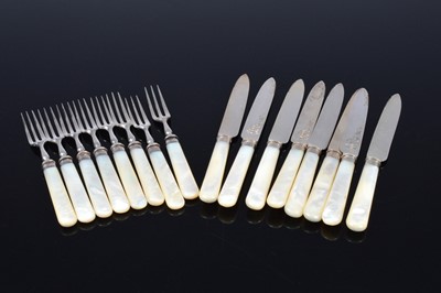 Lot 354 - A set of eight Victorian silver and mother of pearl handled dessert knives and forks from Walker & Hall