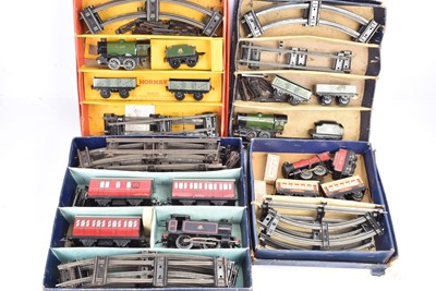 Lot 193 - Four Hornby 0 Gauge clockwork Train Sets