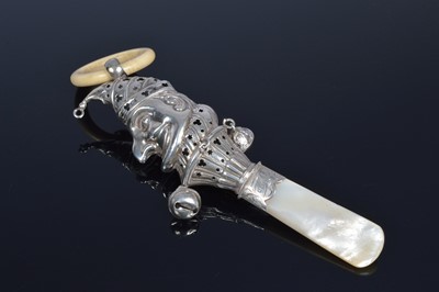 Lot 365 - An early 20th century silver baby's rattle by C&N