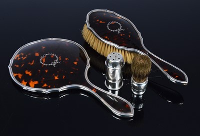 Lot 366 - A George V silver cased travel shaving brush and two silver and tortoiseshell hair brush and hand mirror