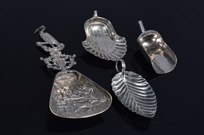 Lot 391 - Four 19th century tea caddy and sugar spoons