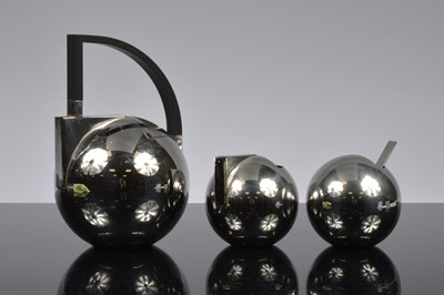 Lot 415 - A modern three piece stainless steel NIO tea set by Oliver Hemming