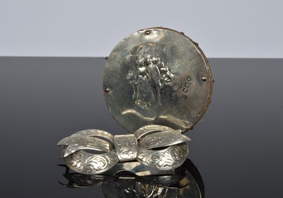 Lot 418 - An Edwardian silver and leather circular pin cushion by William Comyns together with a Victorian silver bow brooch