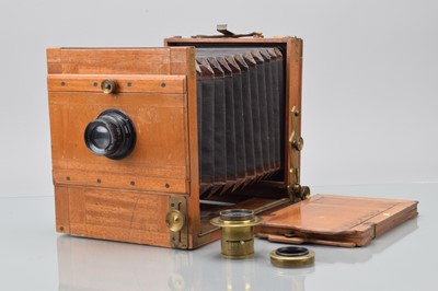 Lot 33 - A Mahogany & Brass Half Plate Tailboard Camera