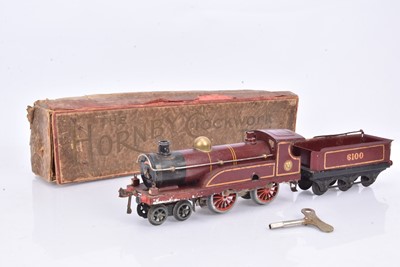 Lot 209 - Hornby 0 Gauge early clockwork No 2 LMS crimson lake 4-4-0 6100 Locomotive and Tender