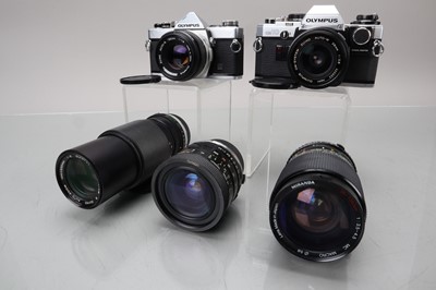 Lot 223 - Two Olympus OM SLR Cameras