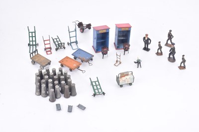 Lot 231 - Hornby and other makers 00 Gauge Platform Trollies Milk Churns Barrows and Porters and Watchman Huts