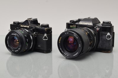 Lot 405 - Two Olympus OM SLR Cameras