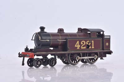 Lot 300 - A restored Bing 0 Gauge clockwork LMS crimson 4-4-0 Tank Locomotive