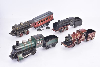 Lot 308 - Bub Krauss and other makers 0 gauge clockwork and electric Locomotives Tenders and Coach