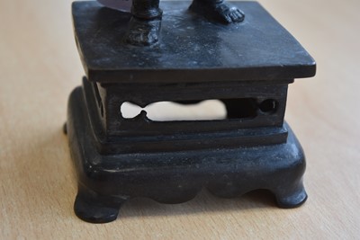 Lot 20 - A pair of Chinese Bronze Candlesticks