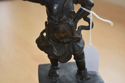 Lot 20 - A pair of Chinese Bronze Candlesticks