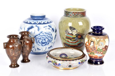 Lot 41 - A small pair of Oriental Bronze Vases