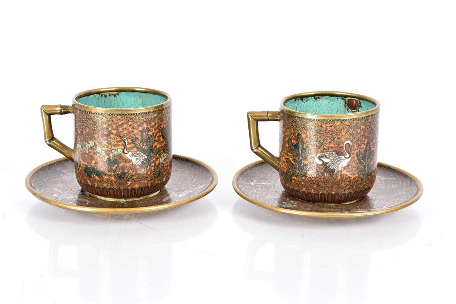 Lot 46 - A Pair of Japanese Cloisonne Coffee Cups and Saucers