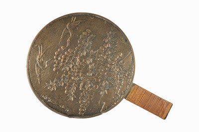 Lot 77 - A Japanese bronze Hand Mirror