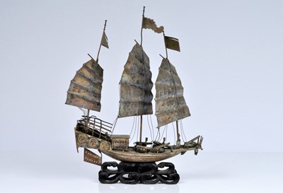 Lot 78 - An early 20th Century Chinese white metal Armed Junk Ship Model