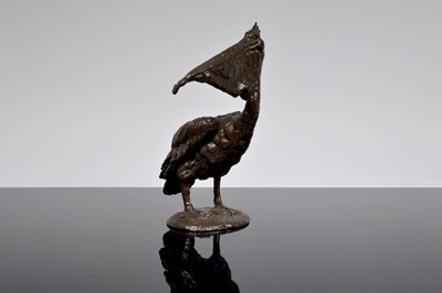 Lot 88 - A large resin figure of a Pelican eating a fish