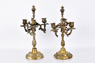 Lot 120 - A pair of Rococo-Style Brass Candelabras