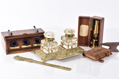 Lot 159 - A Brass and Glass Inkwell Set