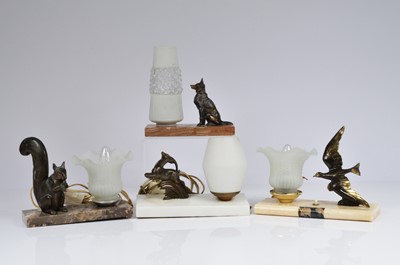 Lot 165 - A collection of four Art deco table lamps