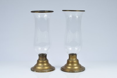 Lot 172 - A pair of brass writers draft hurricane lamps