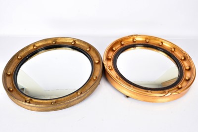 Lot 183 - Two gilt framed convex wall mirrors