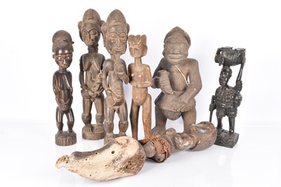 Lot 395 - An assortment of African carved Figures