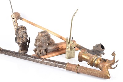 Lot 401 - An assortment of African Smoking Pipes