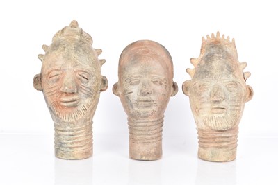 Lot 410 - A group of three Terracotta Head